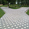 Оформление дорожек тротуарной плиткой  фирмы "Ландшафт"