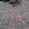 Оформление дорожек тротуарной плиткой  фирмы "Ландшафт"